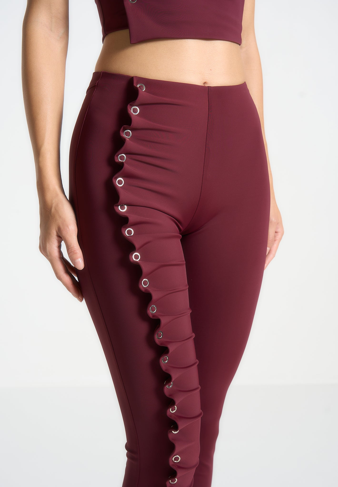 eyelet-detail-tacked-leggings-wine-red 