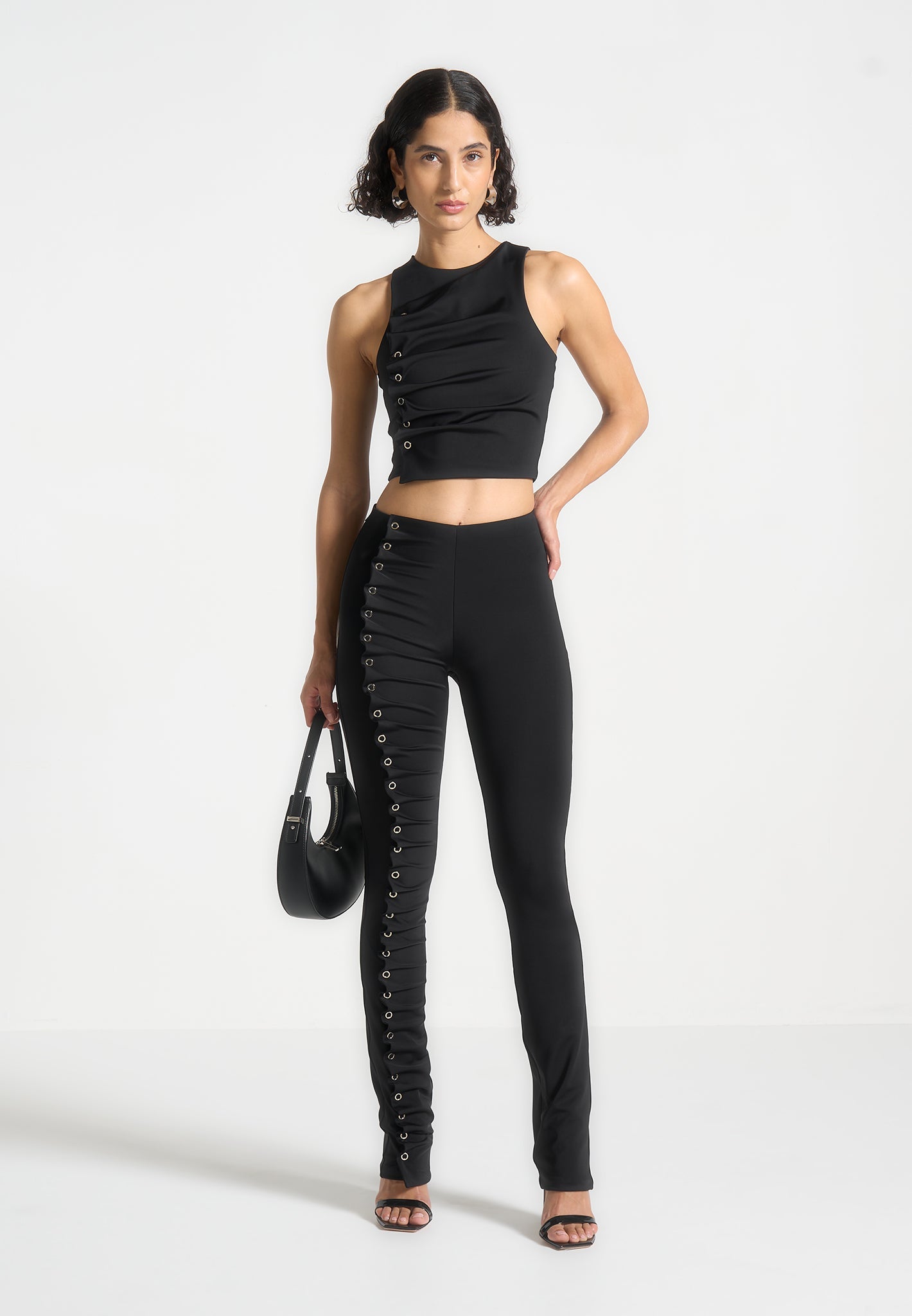 eyelet-detail-tacked-racer-top-black 