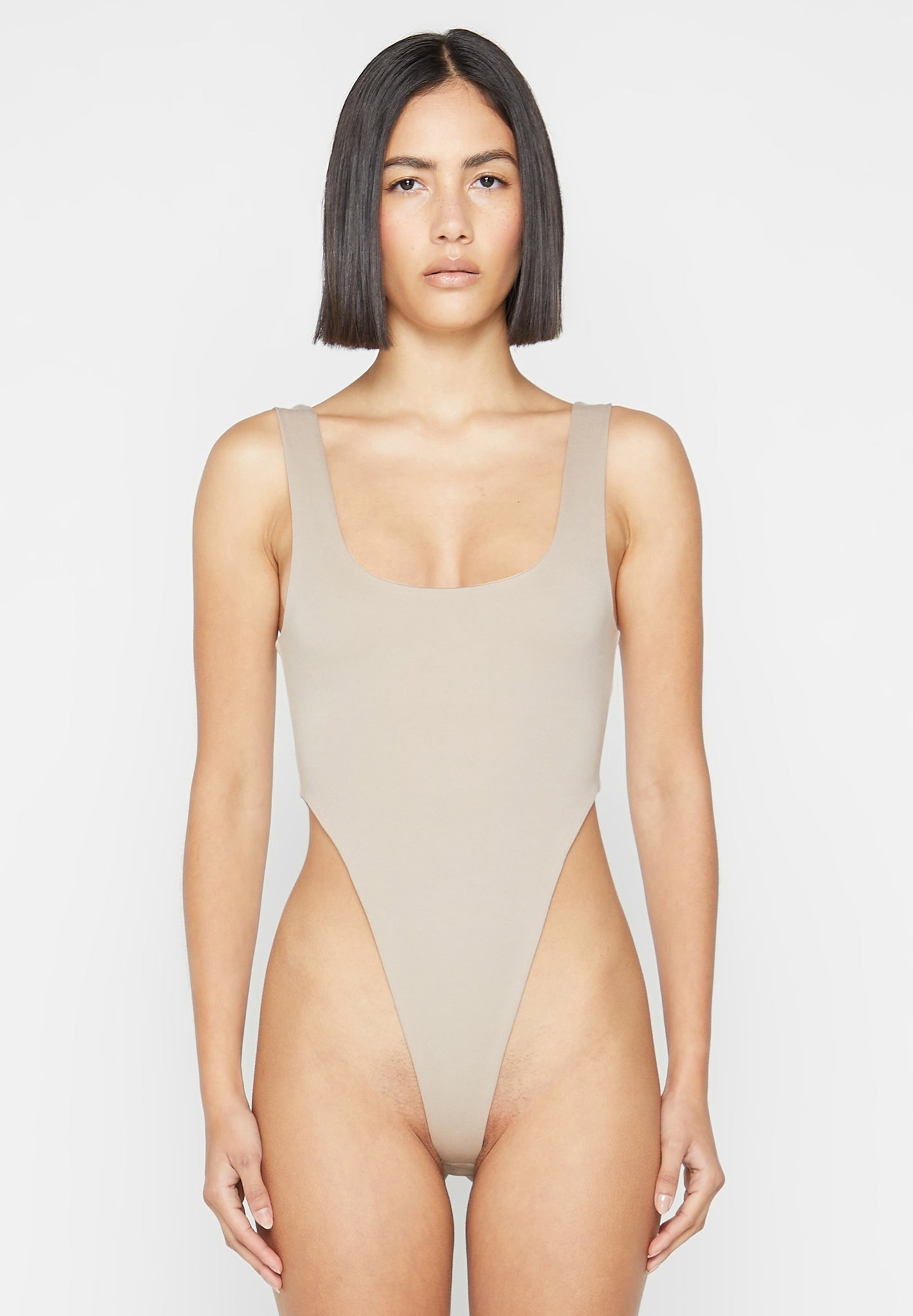 eternelle-high-leg-bodysuit-beige 