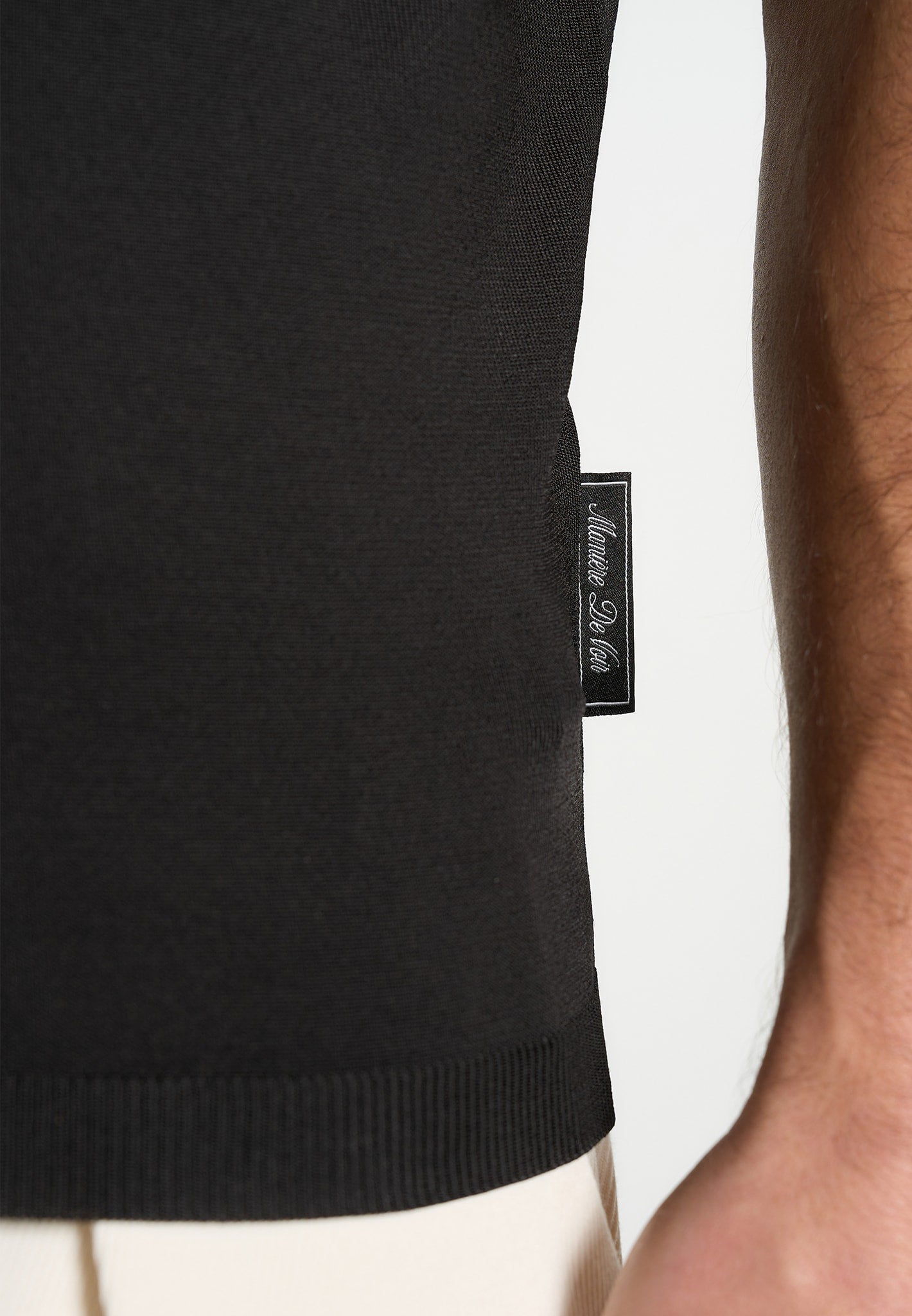 bryn-luxe-knitted-polo-top-black