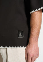 lenny-boxy-polo-shirt-with-whipstitch-detail-black