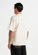 Ari - Unisex Signature Relaxed Fit Cotton T-Shirt - Cream