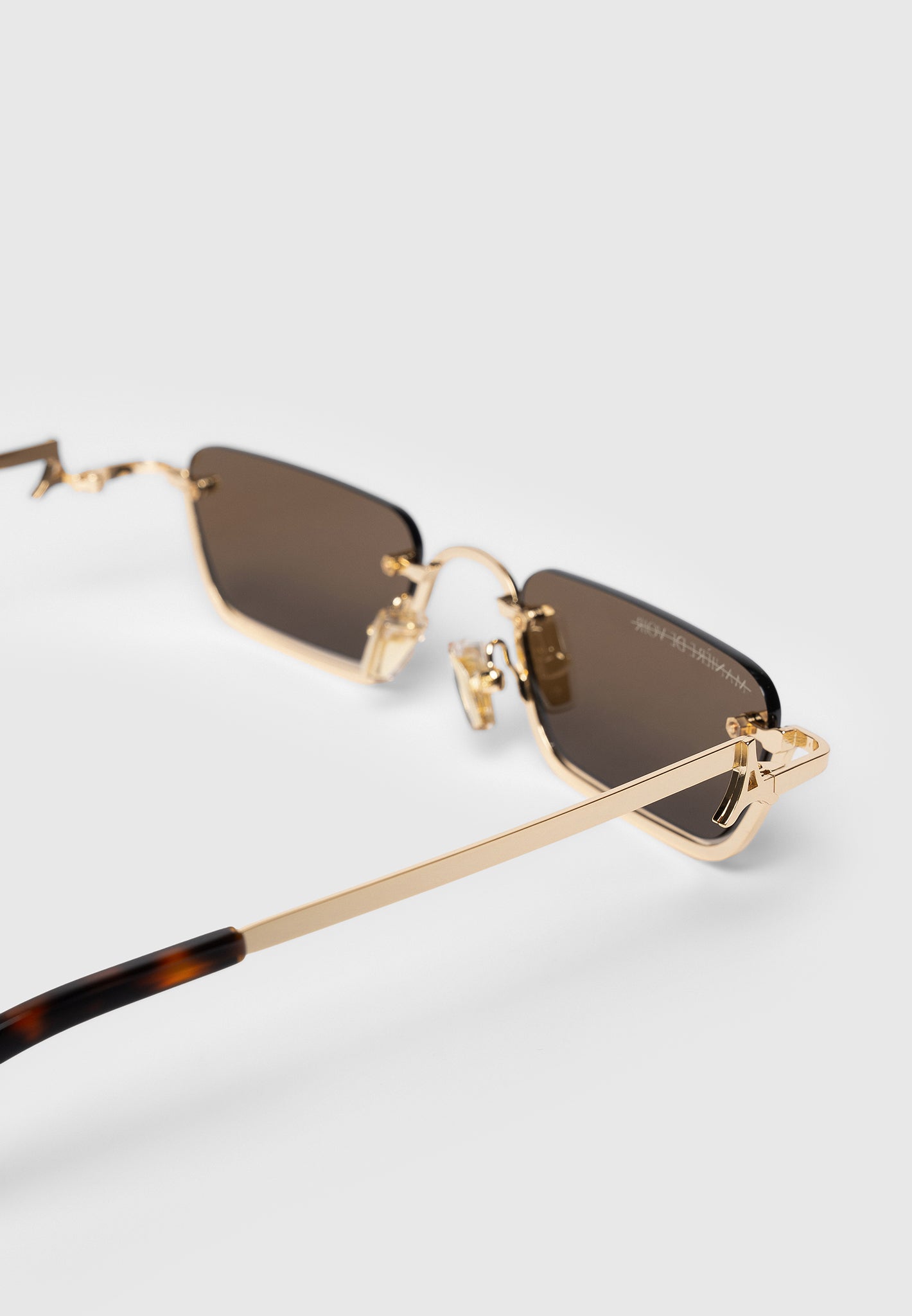 kai-frameless-sunglasses-gold