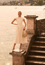 gaia-linen-boat-neck-belted-pleated-midi-dress-natural