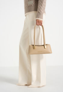 Annelise - Pebbled Leather Baguette Bag - Beige