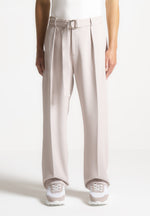 relaxed-fit-textured-belted-tailored-trousers-stone